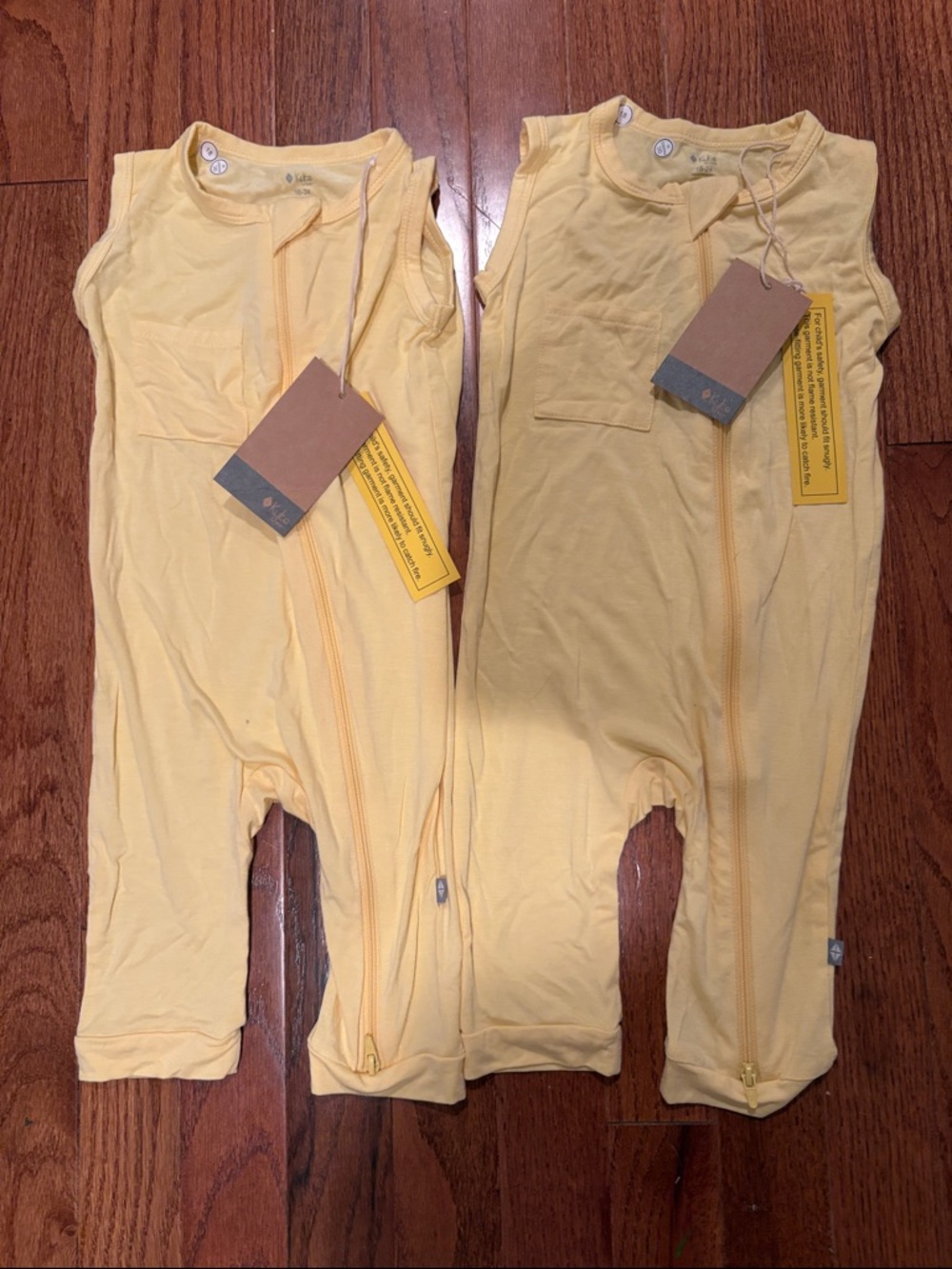 Kyte Baby Yellow Bamboo Sleeveless Zip Rompers (Set of 2)